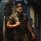 Amos Burton (Wes Chatham) heads to Earth in season five.
